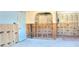 A kitchen under construction featuring white cabinetry, framing, and archways at 4812 Jasper Dr Dr # 101, New Port Richey, FL 34652