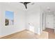 Bright bedroom with hardwood floors, white walls and a large window providing ample natural light at 531 Danube Ave, Tampa, FL 33606