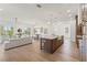 Open floorplan with a generous seating area and modern kitchen island at 531 Danube Ave, Tampa, FL 33606