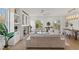 Open concept living area, featuring modern fireplace and an abundance of natural light at 531 Danube Ave, Tampa, FL 33606