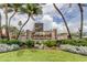 The Seamark Private Residence sign sits among tropical landscaping in front of the condominium building at 5396 Gulf Blvd # 110, St Pete Beach, FL 33706