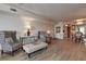 A beautifully staged living room featuring natural light and an open layout at 6400 46Th N Ave # 307, Kenneth City, FL 33709