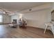 A view of the living room, showcasing its inviting ambiance and new flooring at 6400 46Th N Ave # 307, Kenneth City, FL 33709