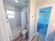 Bathroom featuring a tub and shower combo with tile surround at 7425 245Th E St, Myakka City, FL 34251