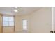 Bright bedroom with a large window, neutral walls, and carpeting at 960 Starkey Rd # 3106, Largo, FL 33771