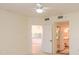 Bedroom featuring an open doorway with a view of the bathroom and kitchen at 960 Starkey Rd # 3106, Largo, FL 33771
