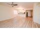 Spacious living area with wood floors and a view of the kitchen at 960 Starkey Rd # 3106, Largo, FL 33771
