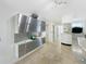 Contemporary kitchen featuring stainless steel cabinetry, stone countertops, and a stylish, functional design at 1123 Hounds Run, Safety Harbor, FL 34695