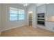 Bright kitchen and dining nook with built-in appliances, custom cabinets, and a pantry at 16206 Diamond Bay Dr, Wimauma, FL 33598