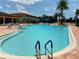 Large community pool features ample space for swimming, lounge chairs, and a relaxing atmosphere at 16206 Diamond Bay Dr, Wimauma, FL 33598