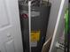 Hot water heater in closet with a Rheem sticker at 2623 Seville Blvd # 111, Clearwater, FL 33764