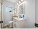 Bright bathroom with sleek fixtures and stylish shelving at 2829 9Th W Ave, Bradenton, FL 34205