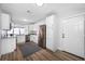 Modern kitchen boasts granite counters, stainless steel appliances, and white cabinets at 2829 9Th W Ave, Bradenton, FL 34205