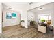Open living area showcasing modern flooring, natural light, and seamless flow to the dining and kitchen spaces at 2829 9Th W Ave, Bradenton, FL 34205