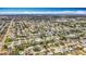 Expansive aerial view showcasing the neighborhood's layout, green spaces, and proximity to the water at 3124 61St N Ln, St Petersburg, FL 33710