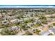Neighborhood aerial view features mature trees, well-maintained lawns, and diverse home styles at 3124 61St N Ln, St Petersburg, FL 33710