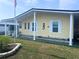Welcoming single-Gathering home with a covered porch and well-kept lawn at 35020 Colony Hills Dr, Zephyrhills, FL 33541