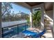 Relaxing outdoor space with a view of the pool and lounge chair, perfect for enjoying the beautiful surroundings at 4604 W Lowell Ave, Tampa, FL 33629