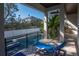 Outdoor view with a covered deck with lounge chairs and a refreshing pool and spa at 4604 W Lowell Ave, Tampa, FL 33629