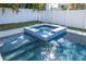 The pool and spa offer a luxurious oasis for relaxation and rejuvenation in your backyard at 4604 W Lowell Ave, Tampa, FL 33629