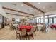 Bright and airy ballroom with high ceilings, elegant lighting, and versatile seating arrangements at 11563 Callisia Dr, Odessa, FL 33556