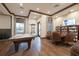 Well-appointed game room featuring a billiards table, a seating area, and plenty of natural light at 11563 Callisia Dr, Odessa, FL 33556