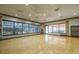 Bright yoga studio with hardwood floors, large windows, and ceiling fans at 11563 Callisia Dr, Odessa, FL 33556