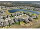 Overview of the neighborhood, highlighting nearby lakes, community layout, and surrounding greenery at 12779 Fisherville Way, Riverview, FL 33579