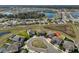 Aerial image of the home's location within a well-planned community, near the lake and amenities at 12779 Fisherville Way, Riverview, FL 33579