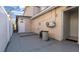 Fenced in backyard with painted patio and door access to interior space at 15701 Springmoss Ln, Tampa, FL 33624