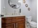 Bathroom with a designer sink, vanity and stylish mirror and decorative fixtures at 15701 Springmoss Ln, Tampa, FL 33624