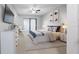 Comfortable bedroom with a queen bed, dresser, and serene decor at 15701 Springmoss Ln, Tampa, FL 33624