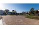 Circular brick driveway, with landscaping and decorative lawn ornaments at 15701 Springmoss Ln, Tampa, FL 33624