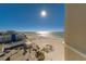 Stunning aerial view showcases beach, ocean, and buildings near residential property at 10 Papaya St # 1404, Clearwater Beach, FL 33767
