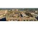 Stunning aerial view of the city's waterfront district, featuring a mix of commercial buildings and ocean views at 10 Papaya St # 1404, Clearwater Beach, FL 33767