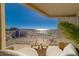 Enjoy breathtaking views from the spacious balcony featuring comfortable seating and stylish decor at 10 Papaya St # 1404, Clearwater Beach, FL 33767