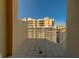Enjoy condo views from the tiled balcony, perfect for morning coffee or sunset watching at 10 Papaya St # 1404, Clearwater Beach, FL 33767