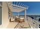 Relax on this spacious balcony with comfortable seating and enjoy city views at 10 Papaya St # 1404, Clearwater Beach, FL 33767