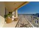 Expansive balcony with seating provides a tranquil outdoor space to enjoy the ocean views at 10 Papaya St # 1404, Clearwater Beach, FL 33767
