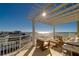 Stylish pergola covers a spacious balcony with comfortable seating, perfect for enjoying panoramic views at 10 Papaya St # 1404, Clearwater Beach, FL 33767