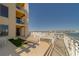 Expansive outdoor balcony with tiled flooring, offers seating, a game area, and amazing skyline and ocean views at 10 Papaya St # 1404, Clearwater Beach, FL 33767