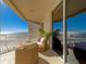 Relax on this balcony with comfortable seating and gorgeous views of the beach and ocean at 10 Papaya St # 1404, Clearwater Beach, FL 33767