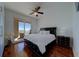 Bright bedroom with hardwood floors and balcony with ocean views at 10 Papaya St # 1404, Clearwater Beach, FL 33767