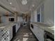 Spacious, modern kitchen with stainless steel appliances, a wine rack, ample counter space and neutral countertops at 10 Papaya St # 1404, Clearwater Beach, FL 33767