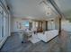 Open living room with water views, industrial style columns, and modern seating at 10 Papaya St # 1404, Clearwater Beach, FL 33767