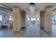 Wide open living room with water views, industrial style columns, and modern lighting at 10 Papaya St # 1404, Clearwater Beach, FL 33767