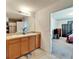 Bathroom featuring a double vanity and tile floors at 12239 Fawn Brindle St, Riverview, FL 33578