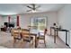 Comfortable dining area with large window overlooking the backyard at 12239 Fawn Brindle St, Riverview, FL 33578