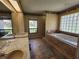 Large bathroom featuring a soaking tub, double sinks and a window with a view at 16311 Colwood Dr, Odessa, FL 33556