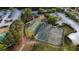 Aerial view of community amenities including courts and playground at 16311 Colwood Dr, Odessa, FL 33556